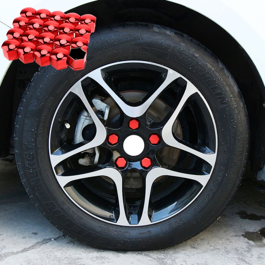 Roda de carro com tampas para porcas vermelhas destacando-se no design da jante e no pneu automóvel